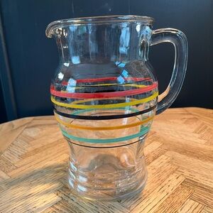 Vintage glass pitcher with stripes